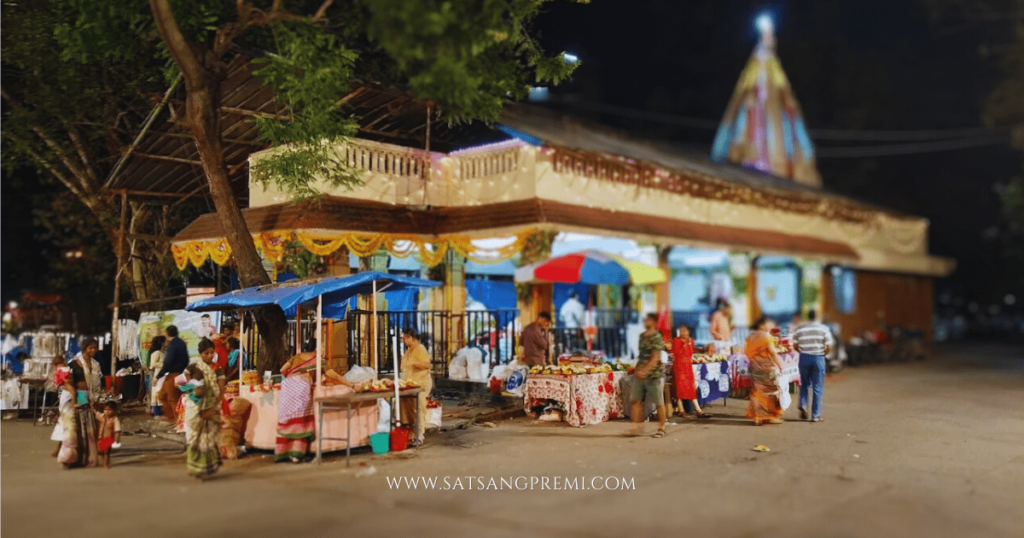 Main gate, interior sanctum, Aarti event, or decorative lighting during Navratri