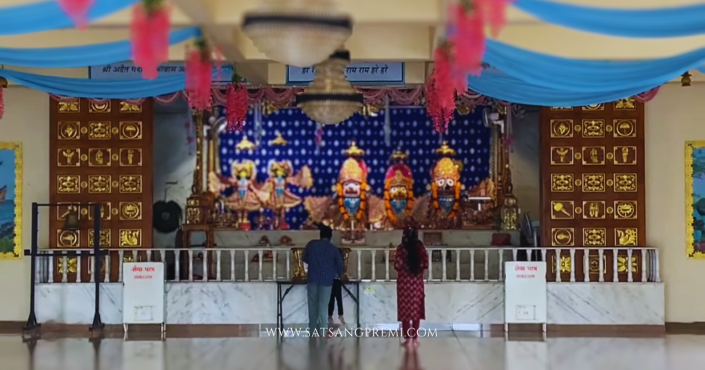 Devotees performing Aarti at ISKCON Kathwada
