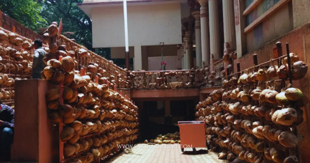 Devotees tying coconuts for Poorna Phala at Karya Siddhi Hanuman Temple